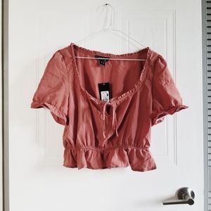 Rust peplum shirt
